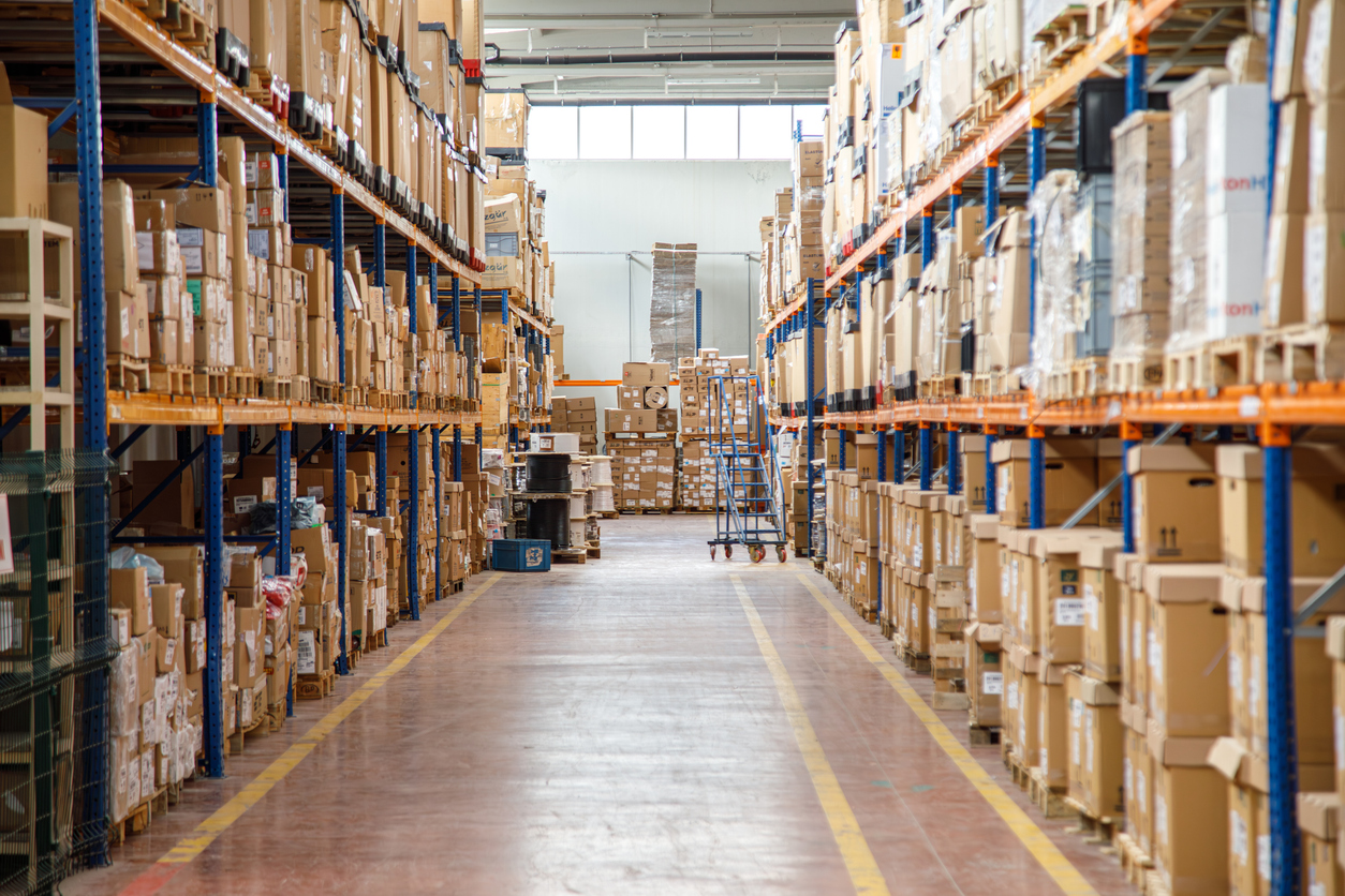 Large-scale UK fulfilment warehouse aisle showing high-density racking storage