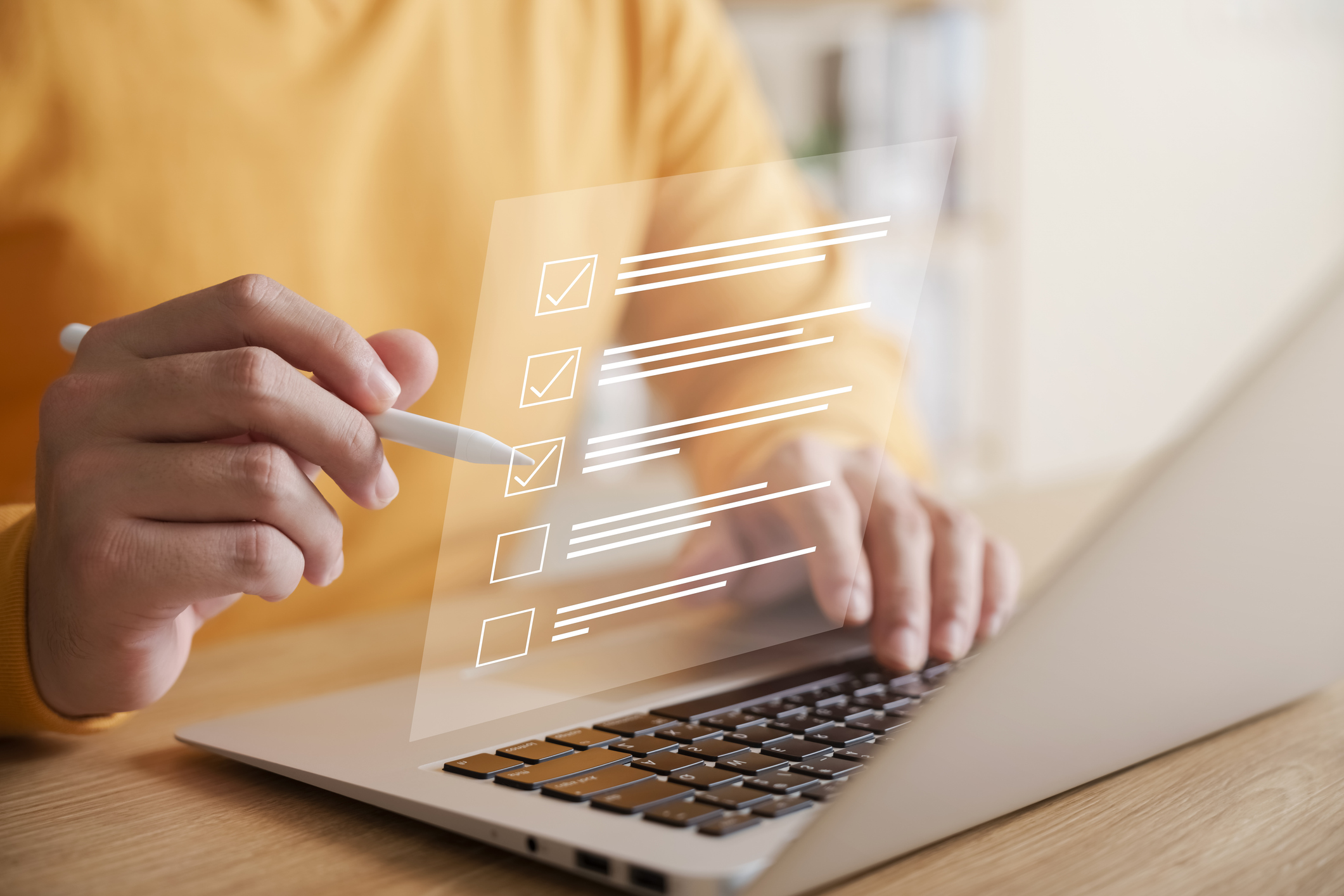 Business checklist concept, businessman using laptop doing online checklist survey, filling out digital form checklist.